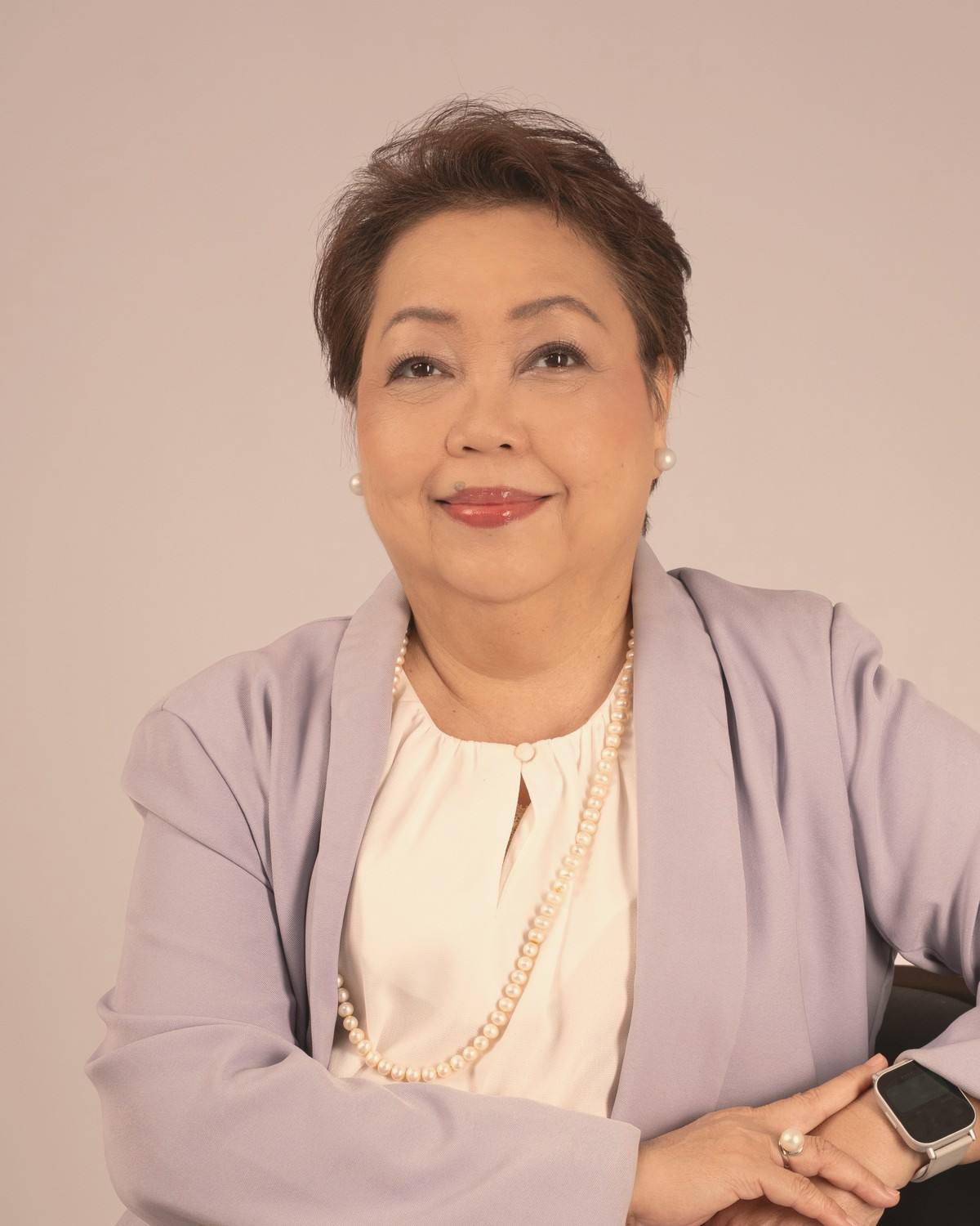Portrait of Maria Liza Fresnido, Co-Founder and Executive Director for OD and HR Programs